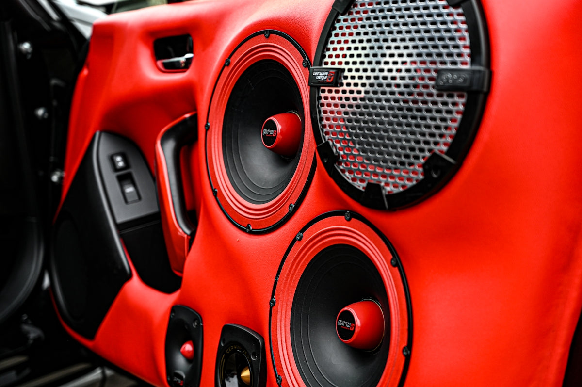 a red car with a black light